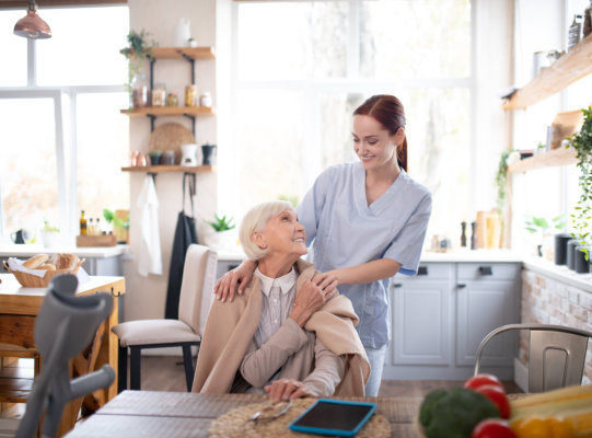 female elderly with the caregiver